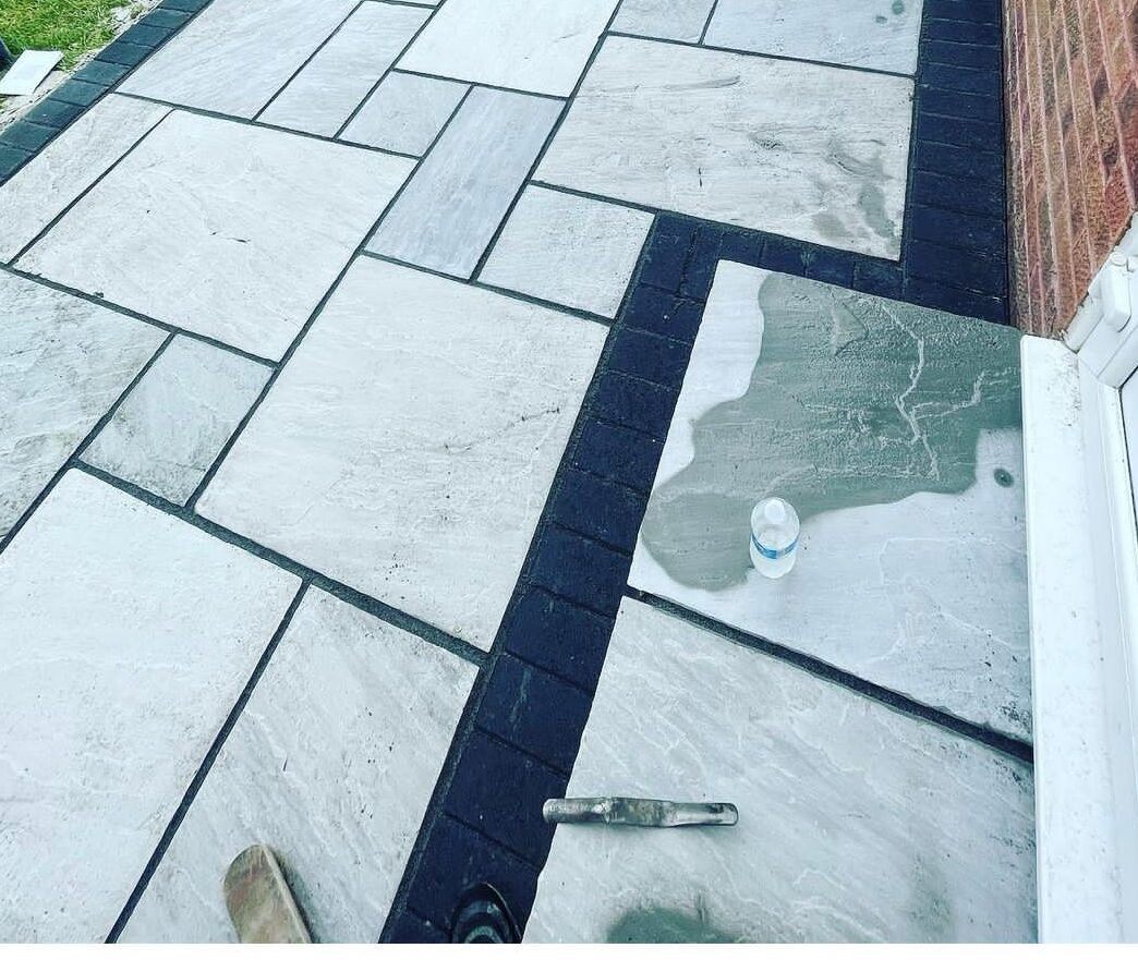 Sandstone paving with a contrast border